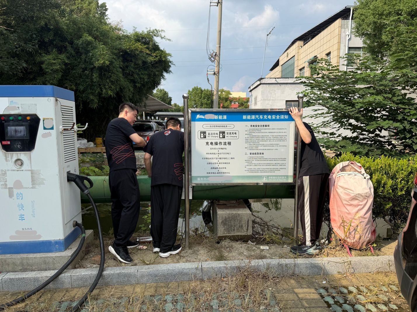 Planck Sensing team examining an outdoor pipeline section